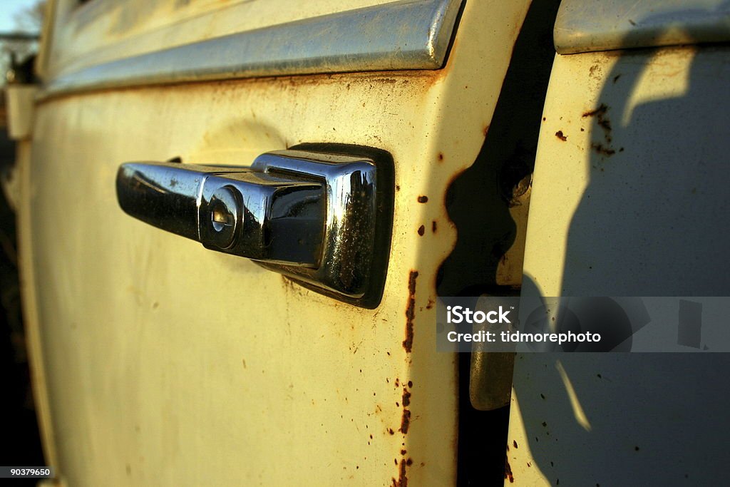 Volkswagen beetle A close up image of the door handle and door of a broke down volkswagen beetle. Car Stock Photo