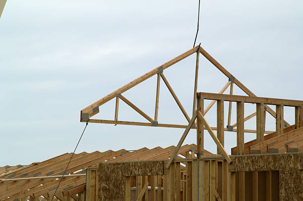 Swinging Roof Truss into Place stock photo