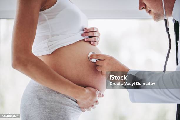 Pregnant Woman With Doctor Stock Photo - Download Image Now - Pregnant, Doctor, Medical Exam