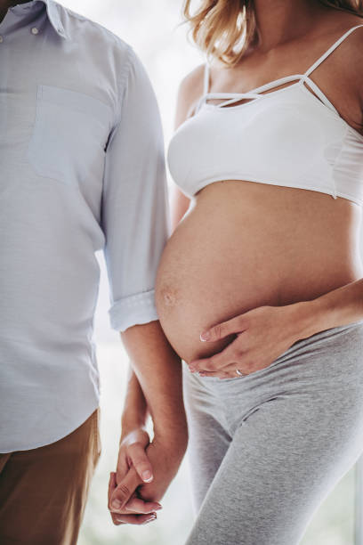 istock Pregnant woman with husband. 903803240