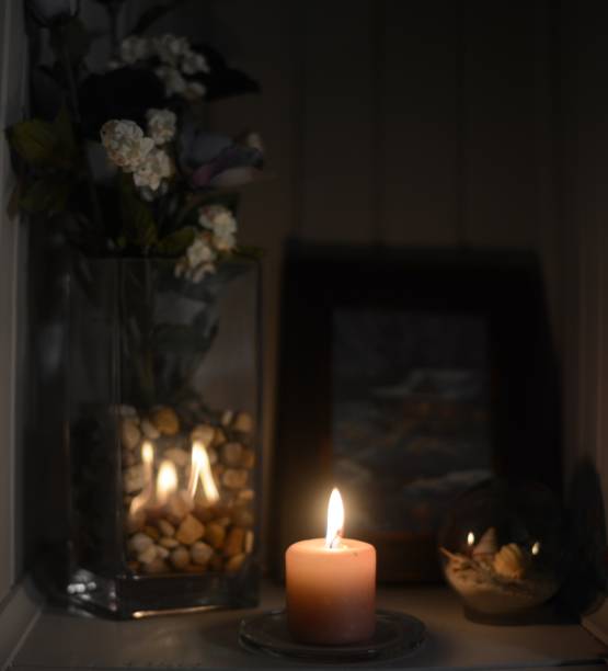 istock Candle ambiance with home decor in background 903807564