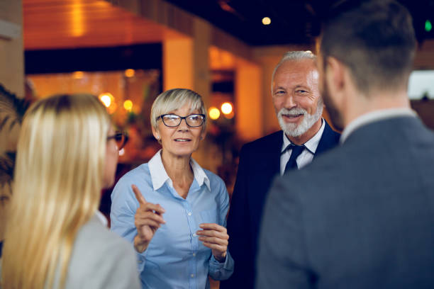 istock Discussing business in a stand up meeting. 903808236