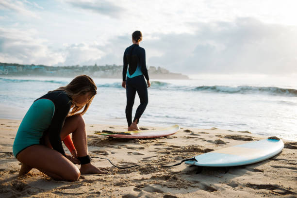 istock Safety before the surfing in waving ocean 903822994