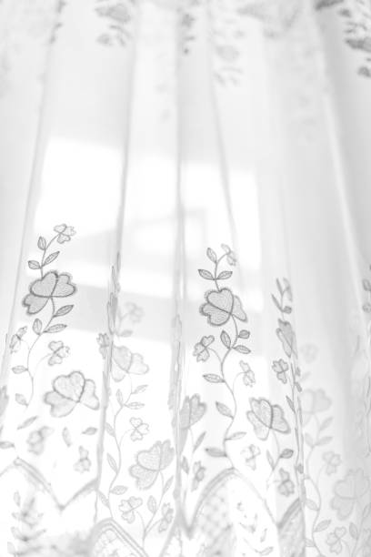 istock White curtains in room, day light 903823214