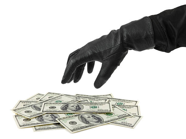 Hand in glove and money  formal glove stock pictures, royalty-free photos & images