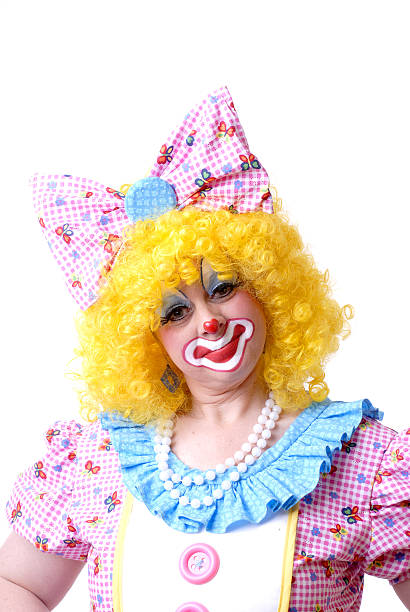 femmina clown in costume intero - quizical foto e immagini stock