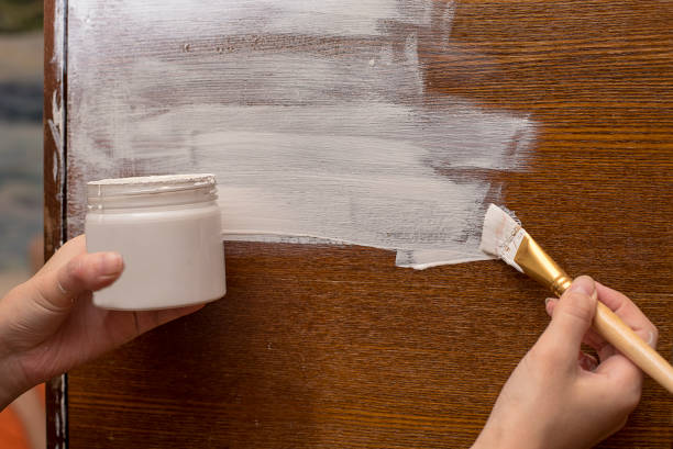 istock Furniture restoration chalk white paint 903856858