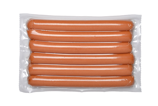 Pack of raw hot dogs isolated on white background with clipping path