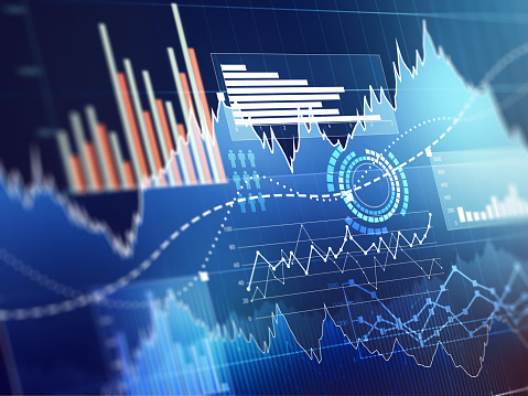 Abstract business chart with uptrend line graph, bar chart and diagram in bull market on dark blue background.