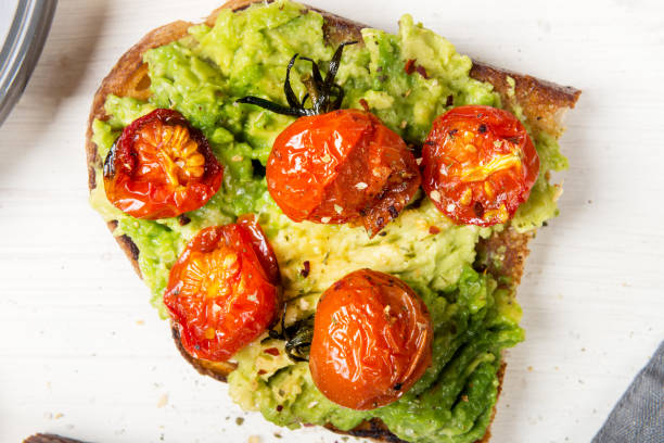 istock white sourdough bread, such as avocado and roasted tomatoes toasts 903865568