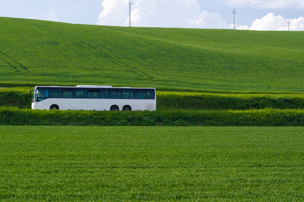 Tourist white bus on mountain road. Ring of Kerry, Ireland. Travel destination