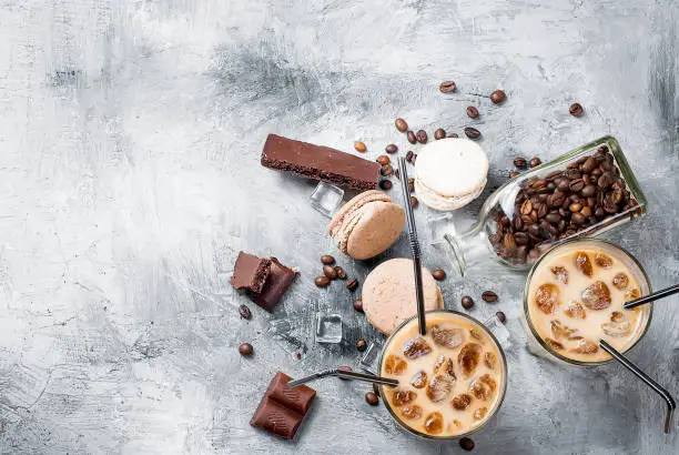 Photo of Iced coffee in glass with ice, chocolate