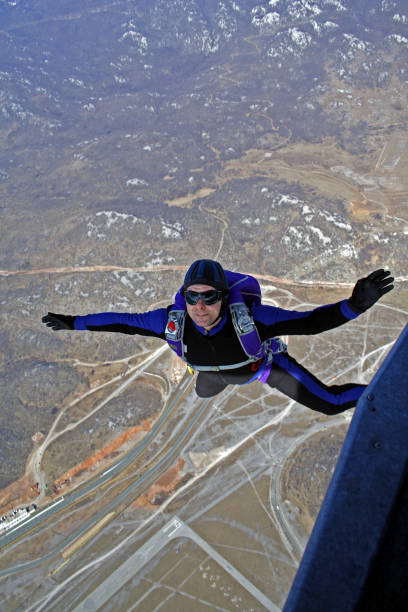 Free fall Parachutist in air glider hang glider hanging sky stock pictures, royalty-free photos & images