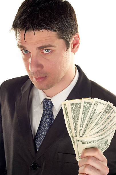 istock Businessman holding money 90388529