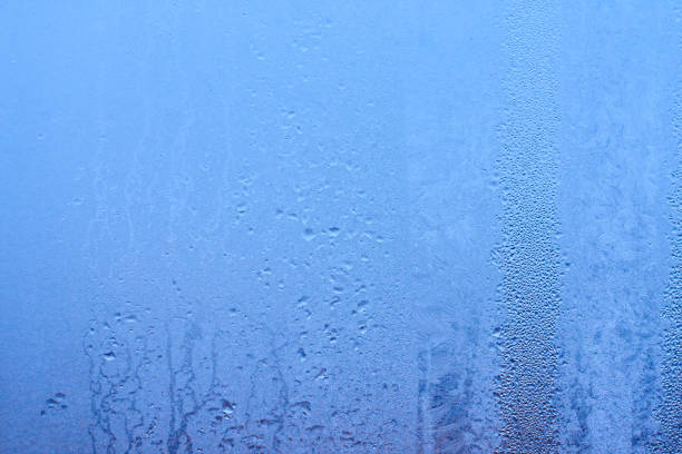 istock Water drops on glass natural bright background 903888214