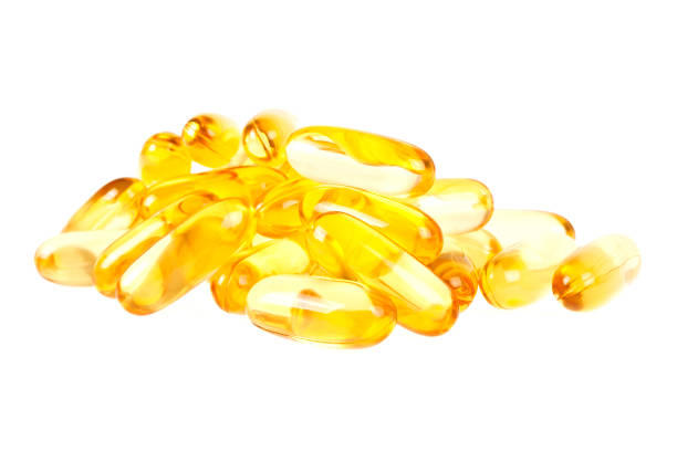 istock Cod liver oil omega 3 gel capsules isolated on white background 903888512
