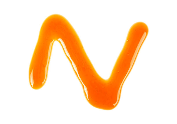 istock Caramel sauce isolated on white background 903892024