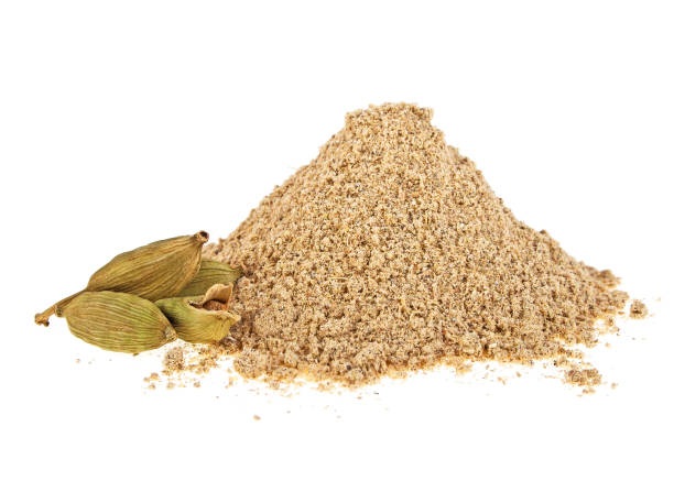 istock Cardamom powder and pods on a white background 903904714