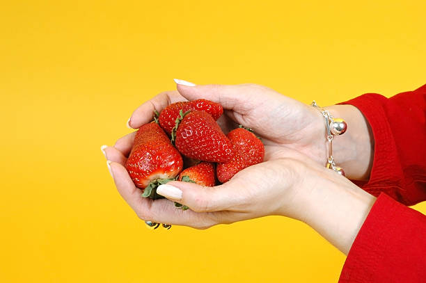istock Handful of strawberry. 90390687