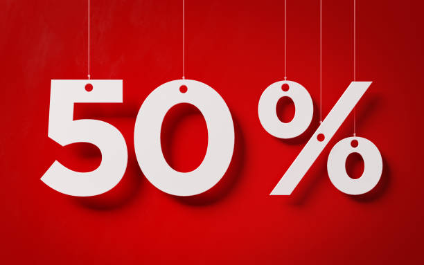istock Sale Concept - White Fifty Percent Text With Strings Over Red Background 903908110