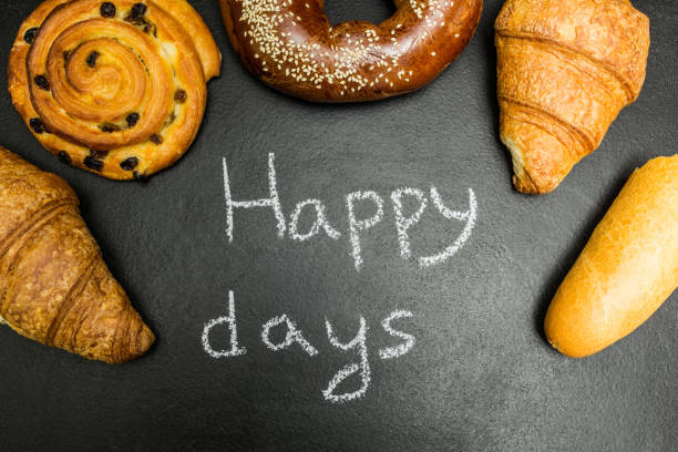 istock Fresh homemade pastries on a black background. Happy days. 903911148