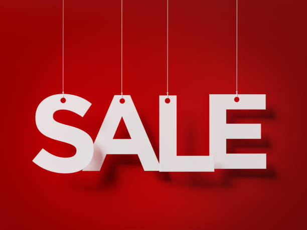Sale Concept -  Sale Text With Strings Over Red Background