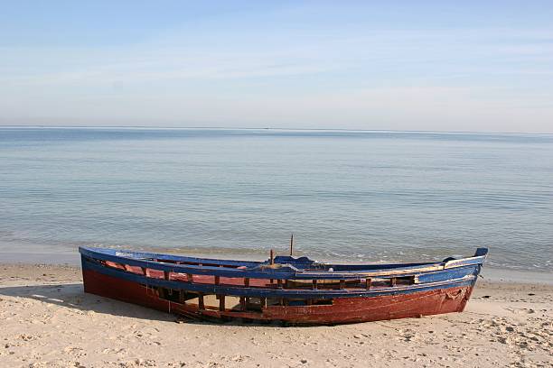 boat on beach stock photo