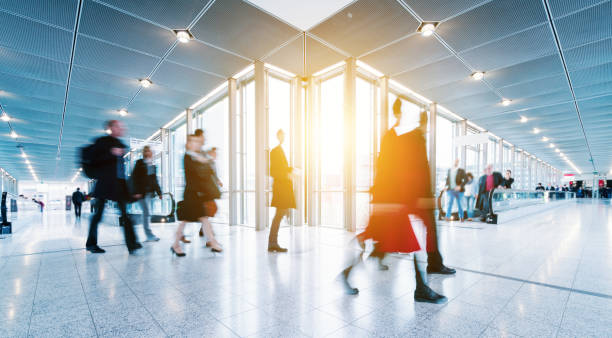 istock blurred crowd of people in a futuristic environment 903920922