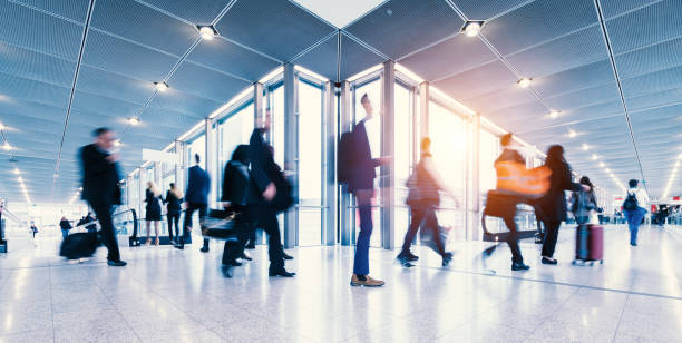 istock blurred crowd of people in a futuristic environment 903920924