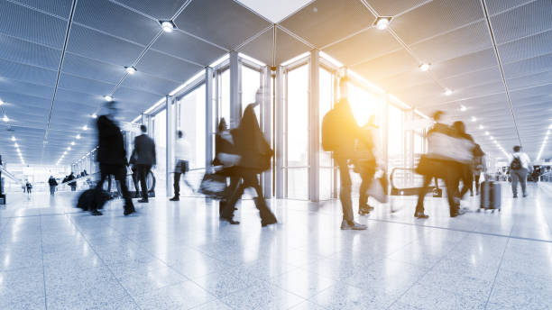istock blurred crowd of people in a futuristic environment 903921046