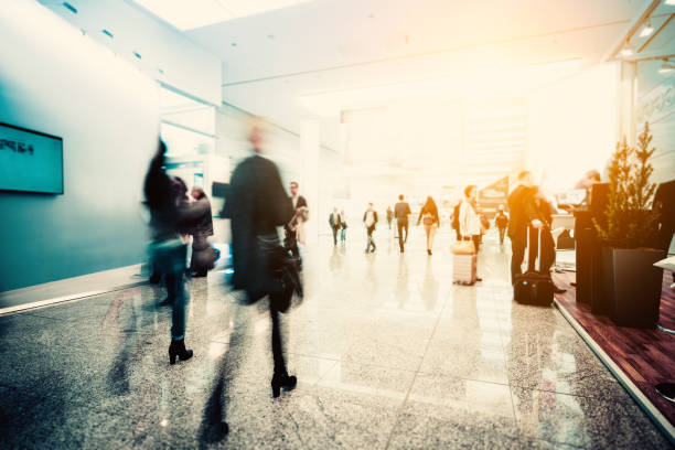 istock blurred crowd of people in a futuristic environment 903921336