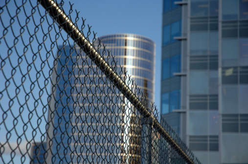 Close up of contemporary modern stainless steel street or park bench