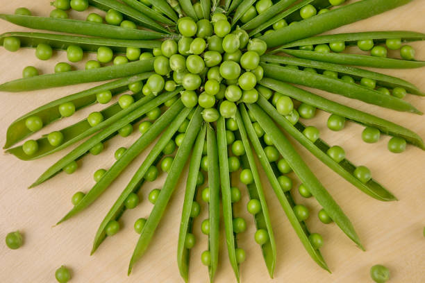 green peas, open pea sticks