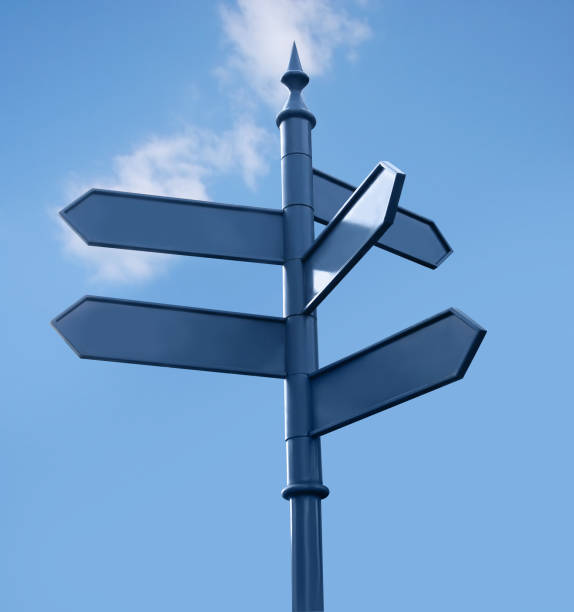 istock Streetsign in the city, 5 directions, sky 90392968