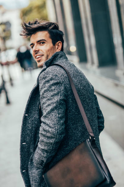istock Elegant man in the city 903932124