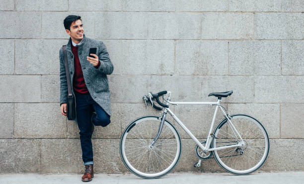 istock Bicyclist texing in the city 903932132