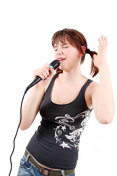 me'am cantar. - singing singer teenager contest fotografías e imágenes de stock