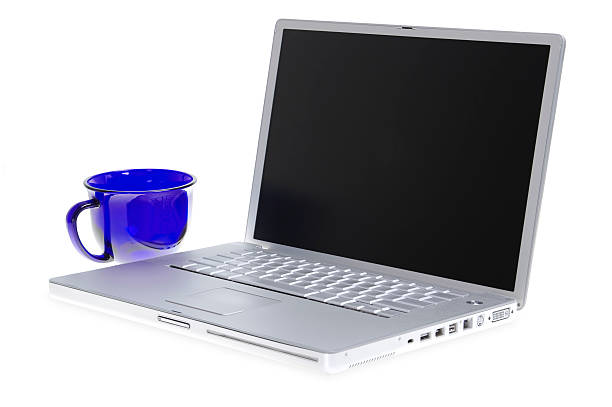ノートパソコンとマグ - computer key internet cafe coffee internet ストックフォトと画像