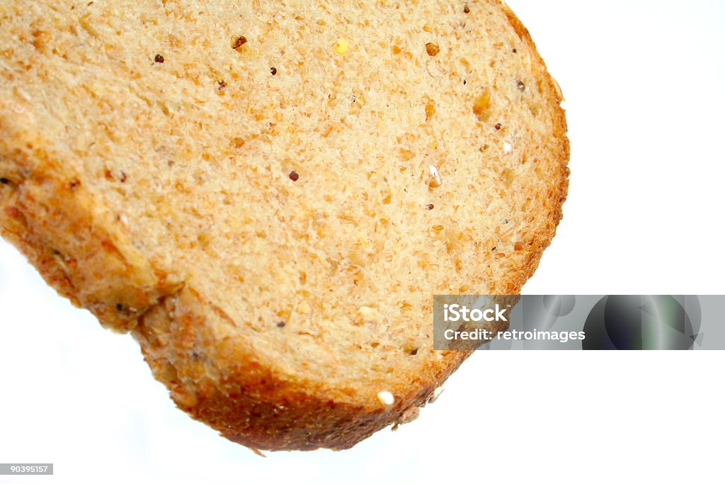 Stück Granary Brot auf weißem Hintergrund. - Lizenzfrei Braun Stock-Foto