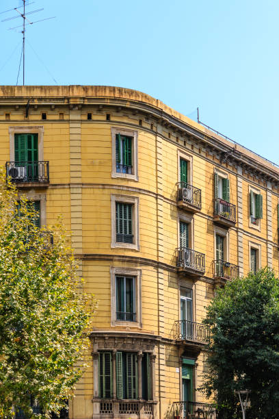 istock Curved Corner of Yellow Stone Apartment 903960190