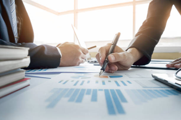 istock Business People Working At Desk In Office 903968544