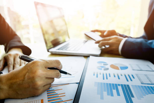 istock Business People Working At Desk In Office 903973076