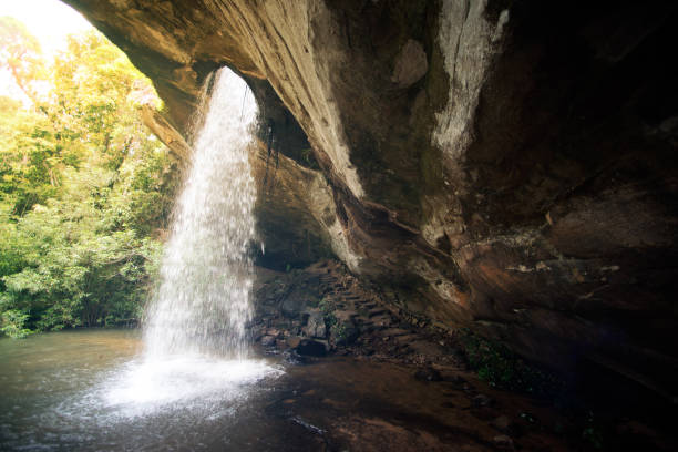 istock Sang Chan Waterfall is sometimes called Namtok  Long Ru ( Waterfall Through a Hole ). 903981926