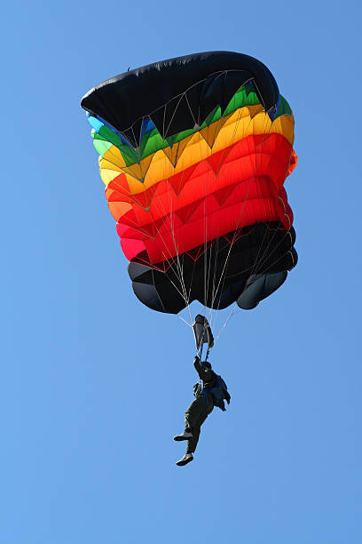 Parachutist in air parachutist in the air glider hang glider hanging sky stock pictures, royalty-free photos & images