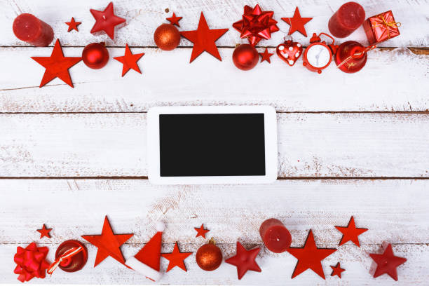 istock High Angle View Of Christmas Decorations With Tablet Computer On Table 903988634