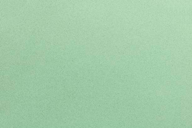 Texture of light green metal, abstract background.
