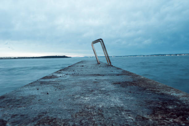 End of the empty Bay at blue hour. Punta del Este, Uruguay. Perfect sea spot for swimming.