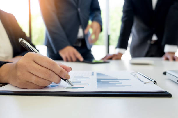 istock Business People At Desk In Office 903999814