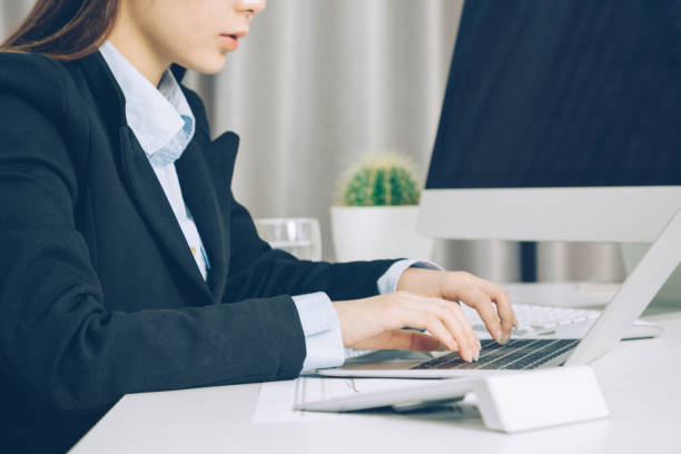 istock business woman working on laptop 904007892