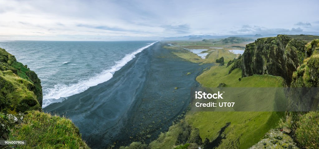 Iceland Panorama A panoramic view of the black sand beach in Iceland. Beach Stock Photo